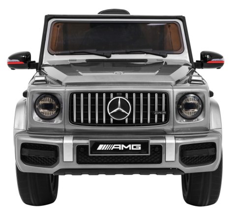 Mercedes AMG G63 dla dzieci Lakier Srebrny + Pilot + MP3 LED + Wolny Start + EVA + Pasy Mercedes AMG G63 dla dzieci Lakier Srebrny + Pilot + MP3 LED + Wolny Start + EVA + Pasy