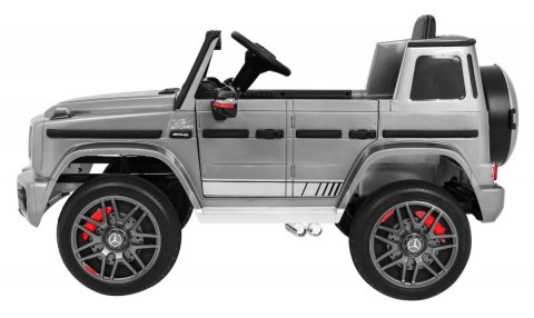 Mercedes AMG G63 dla dzieci Lakier Srebrny + Pilot + MP3 LED + Wolny Start + EVA + Pasy Mercedes AMG G63 dla dzieci Lakier Srebrny + Pilot + MP3 LED + Wolny Start + EVA + Pasy