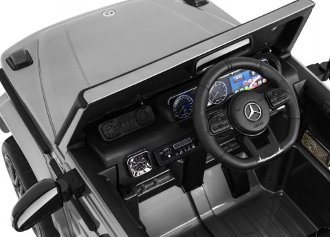 Mercedes AMG G63 dla dzieci Lakier Srebrny + Pilot + MP3 LED + Wolny Start + EVA + Pasy Mercedes AMG G63 dla dzieci Lakier Srebrny + Pilot + MP3 LED + Wolny Start + EVA + Pasy