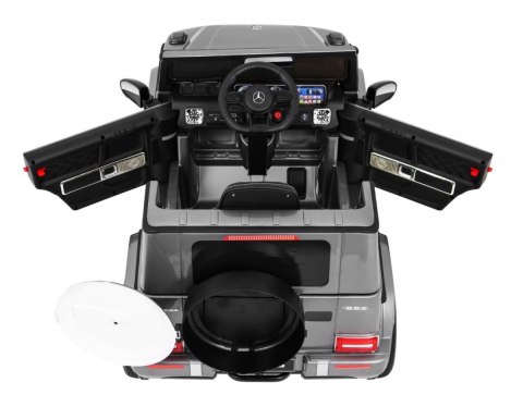 Mercedes AMG G63 dla dzieci Lakier Srebrny + Pilot + MP3 LED + Wolny Start + EVA + Pasy Mercedes AMG G63 dla dzieci Lakier Srebrny + Pilot + MP3 LED + Wolny Start + EVA + Pasy